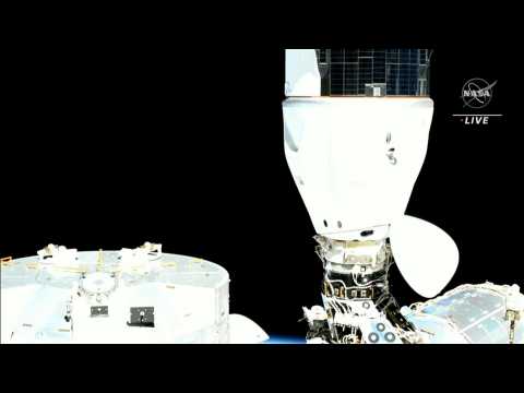 SpaceX Dragon capsule docks with International Space Station