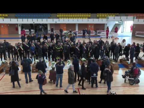 People in Italy's Crotone pay respects to victims of deadly shipwreck