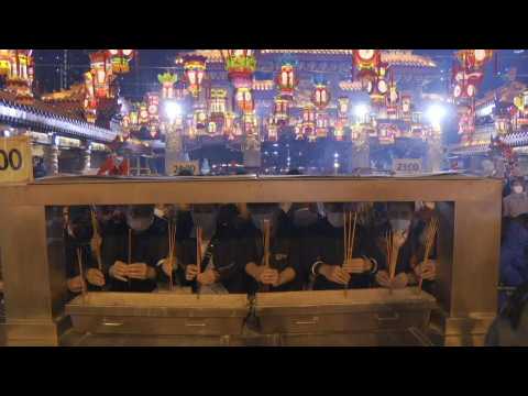 Hong Kongers light first incense sticks at temple to welcome Year of Rabbit