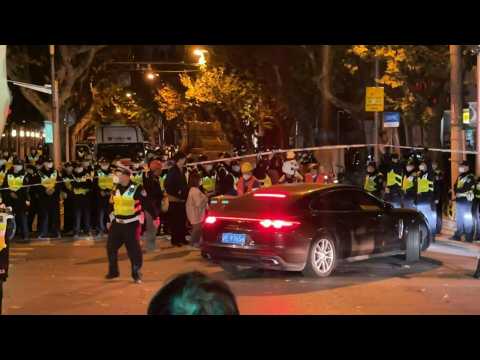 China: Police stand guard at site of Shanghai protest