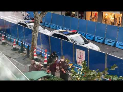 Images of police presence and barriers at Shanghai protest site