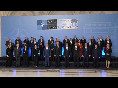 NATO foreign ministers pose for family photo as meeting in Bucharest opens