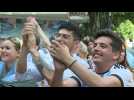 Argentinian fans celebrate first goal against Poland at the World Cup