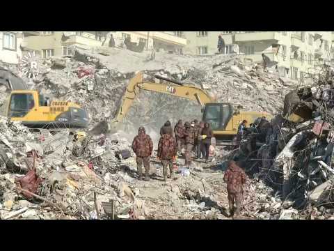 Excavators dig through rubble in Turkey's quake-hit Kahramanmaras