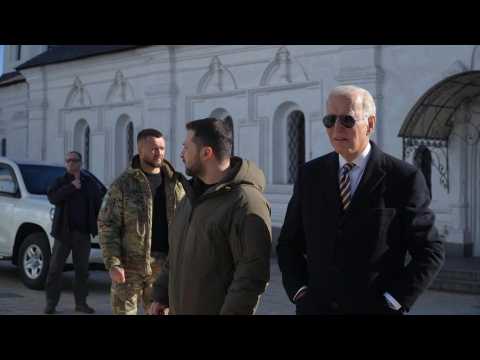 On surprise visit to Kyiv, Biden and Zelensky honour war dead as air sirens blare