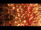 Hundreds attend candlelight vigil for Indonesia's football riot victims