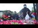 Indonesia's football fans throw petals in tribute to victims of deadly riot