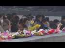 North Koreans lay flowers on New Year's Day