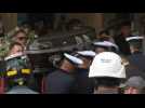 Brazilian football great Pele's coffin arrives at cemetery