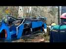 Emergency workers in Galicia pull bus out of river after deadly crash
