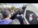 ambulances evacuate Iraqis outside football stadium after deadly stampede