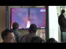 Seoul residents watch news on latest North Korea missile launch