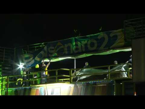 Bolsonaro supporters pack up huge banner after Lula wins runoff