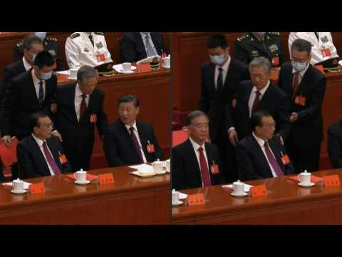 Former Chinese leader Hu unexpectedly leaves Congress closing ceremony
