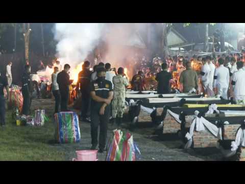 Families gather for cremation of Thai nursery victims
