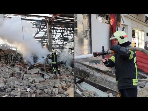 Images of the aftermath of a Russian strike on a warehouse in Kharkiv