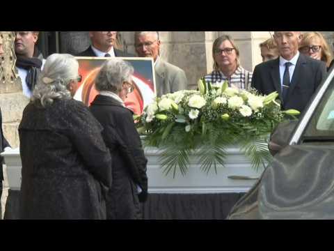 Coffin of murdered French schoolgirl leaves church