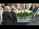 Coffin of murdered French schoolgirl leaves church