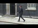 New UK Prime Minister Sunak leaves Downing street to go to Parliament