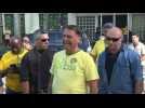 Brazil President Jair Bolsonaro leaves polling station after voting