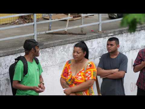 Brazilians queue outside polling station in Rio favela