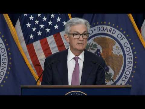 US Fed unveils smaller rate hike and signals inflation fight not over