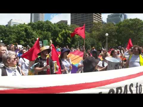 Protesters march outside Australian cardinal Pell’s funeral