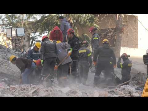 French rescuers work at site of collapsed building after Turkey's deadly quake