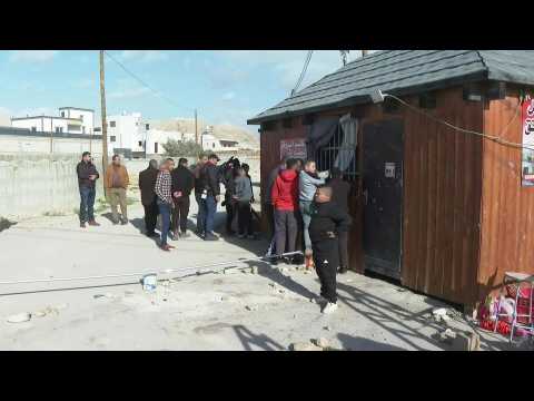 Palestinians gather on site of deadly Israeli army raid