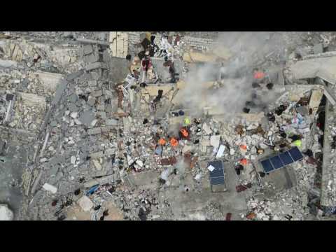 Rescuers search through rubble in Syria's Sarmada after deadly 7.8 earthquake