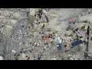 Rescuers search through rubble in Syria's Sarmada after deadly 7.8 earthquake