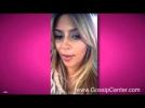 Kim Kardashian Hides From Paparazzi