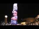 Image of New Zealand's Ardern projected onto Dubai skyscraper