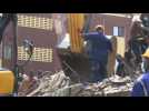 Emergency workers on scene of Lagos building collapse