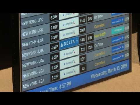 Passengers wait at MIA after US grounds Boeing 737 MAX planes