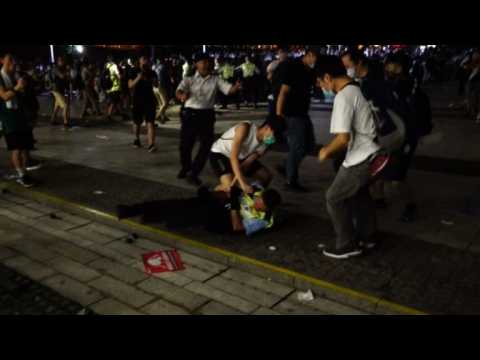 Violence breaks out as police try to clear Hong Kong protesters