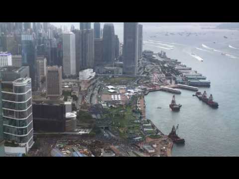 Anti-government protesters block main artery roads in Hong Kong