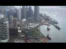 Anti-government protesters block main artery roads in Hong Kong
