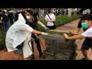 Hong Kong protesters prepare barriacdes near government offices