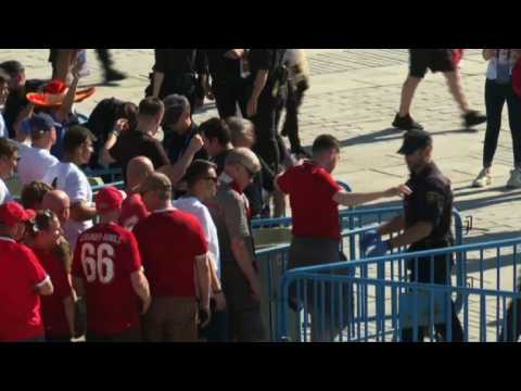 Fans arrive at the stadium for the Champions League Final