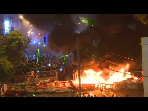 Protesters set large barricade fire near Hong Kong police HQ
