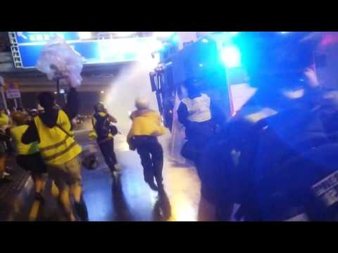 Hong Kong police use water cannon in latest clashes