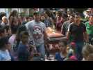Families start to bury victims of Mexico bar fire attack