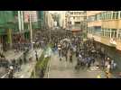 'We're still here': Hong Kong protesters return to streets