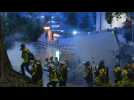 Volleys of tear gas in Hong Kong protesters take shopping district again