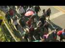 Hundreds of Central American migrants cross into Mexico from Guatemala