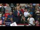 Trump arrives at campaign rally in New Hampshire on the eve of vote
