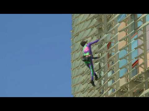 French 'Spiderman' climbs Barcelona skyscraper