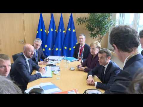 Macron, Merkel and EU Council chief Michel meet before summit