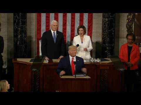US President Donald Trump arrives in House chamber to deliver State of Union speech